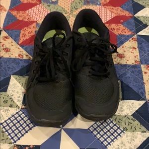 Black running Nike sneakers